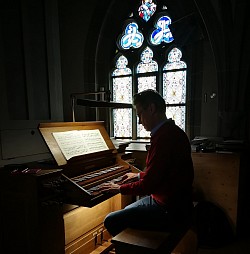 Organist in church