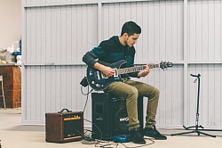 Guitarist with amps